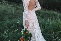 a modern romantic lace A-line wedding dress with long sleeves, a high neckline, a short train is a lovely idea for a modern bride