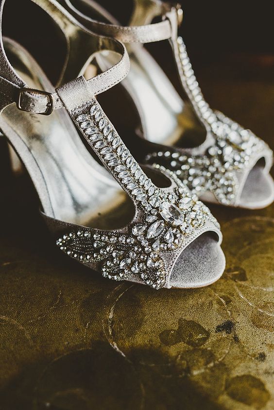 glam vintage wedding shoes in grey, with T-straps and heavy embellishments add a shiny touch to the look