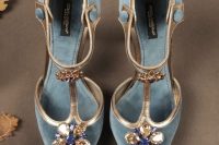 super refined vintage wedding shoes of blue velvet, gold touches and large embellishments for a touch of ‘something blue’