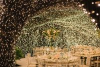 the whole ceiling and walls covered with lights create a fantastic glam space and you won’t need more light in here