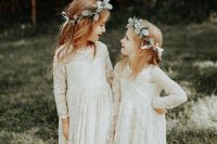 white lace maxi dresses with trains and long sleeves plus greenery crowns for a boho wedding
