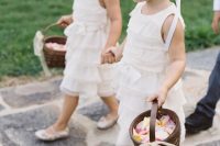 white sleeveless ruffle midi dresses and baby’s breath crowns plus flat shoes for an elegant and traditional look