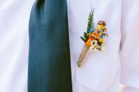 a lego-inspired groom’s boutonniere design