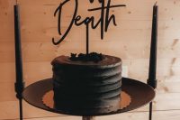 a stylish black wedding cake