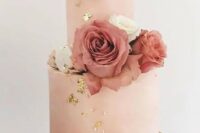a cute pink buttercream wedding cake