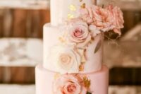 a cool wedding cake with a white and light pink tier, gold foil, pink and white roses is a lovely idea for spring and summer