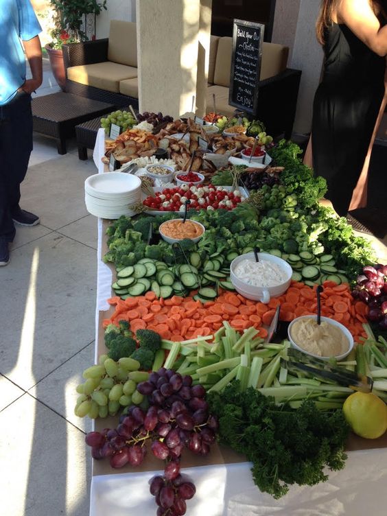 a fresh veggie and fruit salad bar with various kinds of dressing is a great idea that works for any wedding