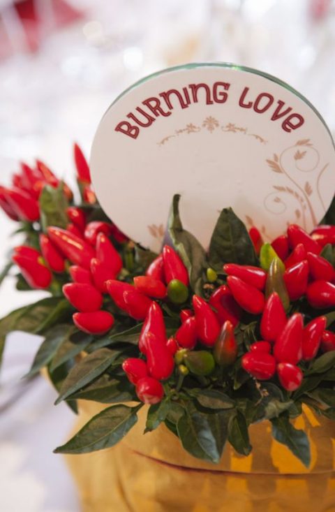 a fun idea of chilli pepper centerpiece to show the burning love - what can be whimsier and cuter