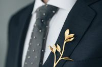 a gilded branch as a boutonniere is an elegant solution that looks out of the box and adds chic and style to the look