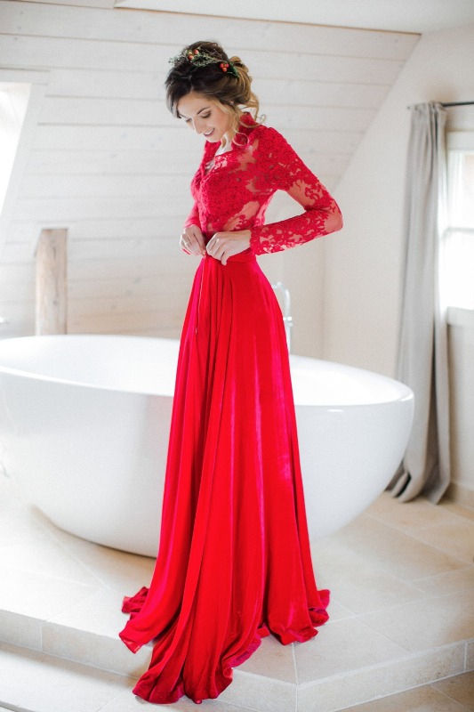 a hot red A-line wedding dress with a lace bodice and pleated skirt plus a train is an amazing idea for a holiday wedding