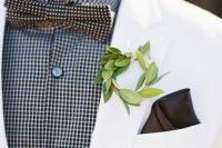 a leafy wreath wedding boutonniere is an elegant idea of a non-traditional accessory that doesn’t look too much