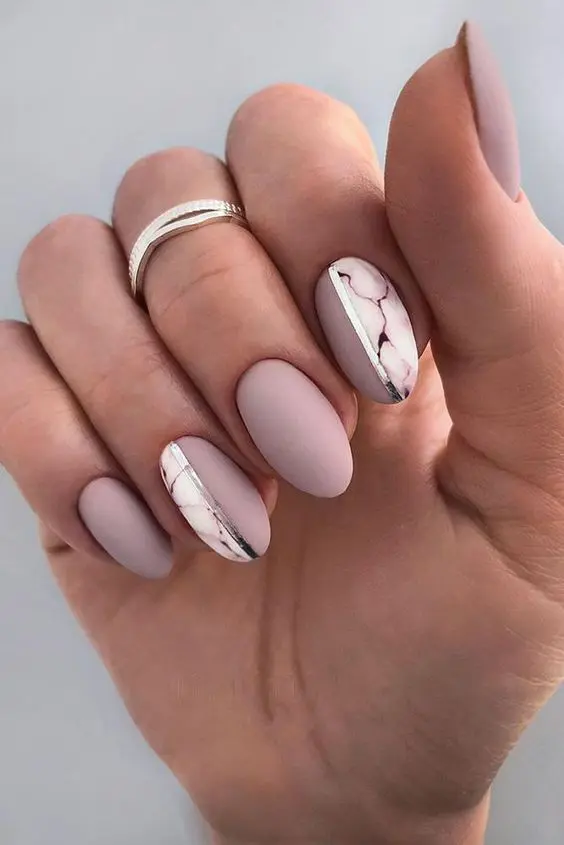 a mauve wedding manicure with lilac marble touches and silver stripes is a lovely idea for a modern spring or summer bride