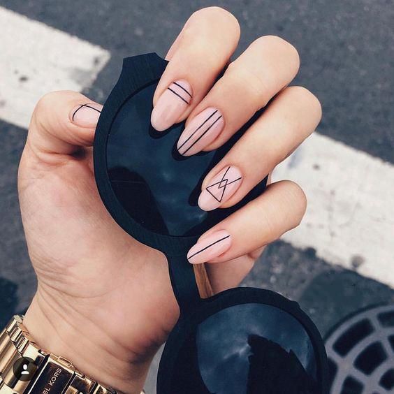 a nude and black geometric nail art is a very boho and cool solution that may be rocked any time