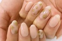 delicate blush wedding nails with gorgeous gold glitter stars are a nice idea for a celestial bride in spring and not only