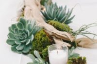 driftwood, moss, candles and succulents and air plants for a beach or seaside wedding