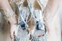fully embellished pale blue wedding shoes with criss cross straps are gorgeous and jaw-dropping
