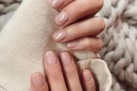 glossy nude nails are chic and stylish and can fit absolutely any bridal look anytime, they are delicate and chic