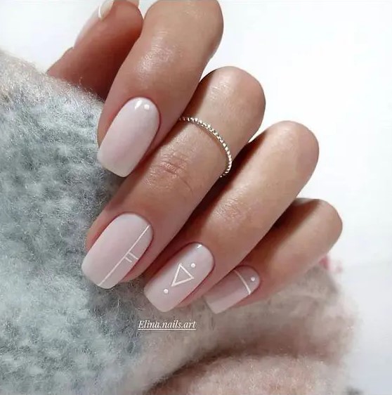 icy pink nails with white boho patterns are amazing for a modern boho bride and look very stylish