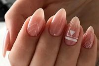 light pink nails with white boho patterns are a very stylish and chic idea for a boho bride and these colors are timeless