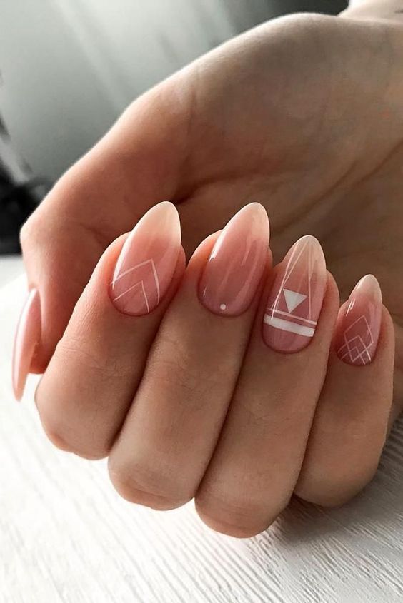 nude nails with white boho patterns are a very stylish and chic idea for a boho bride and these colors are timeless