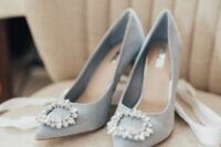 pale blue embellished wedding shoes with beautiful rhinestone buckles are adorable for a chic bridal look