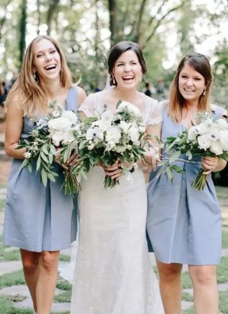 pale blue knee bridesmaid dress with thick straps, V-necklines and pleated skirts are great for a spring or summer wedding