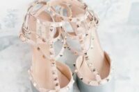pale blue spiked wedding shoes are a gorgeous idea of your something blue at the wedding