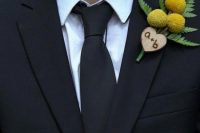 pretty wood heart with wood burning and billy balls wedding boutonniere is a good idea for a rustic or a woodland wedding