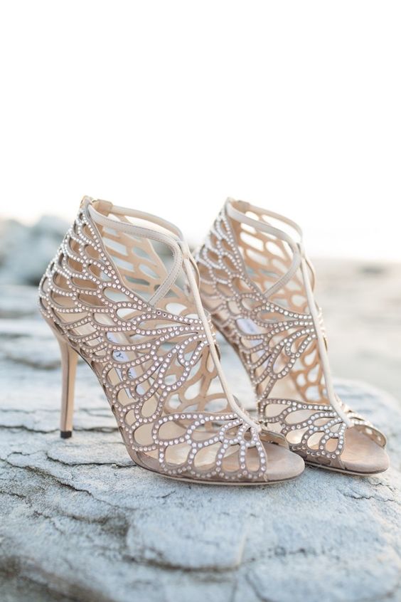 taupe laser cut fully embellished wedding shoes with cutouts and peep toes look very bold and statement