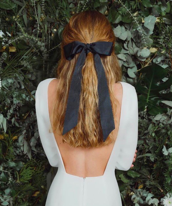 thick black ribbon adds such a stylish touch to this classic half up, half down hairstyle