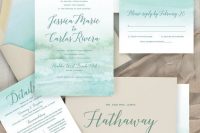 a beach wedding invitation suite done with tan, light green and aqua colors, with watercolors and calligraphy is a very cool and chic idea