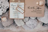 a beach wedding invitation suite with karft paper envelopes, with a cool invites with burlap and starfish and a tag is amazing