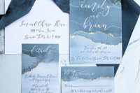 a beautiful blue and light blue watercolor wedding invitation suite with calligraphy and gold touches is a very lovely idea
