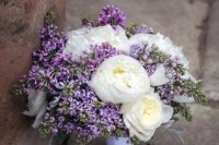 a chic lilac and white peony wedding bouquet with a lilac ribbon is amazing and very beautiful