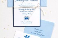 a colorful beach wedding invitation suite with light blue envelopes, bold navy printing and sea-inspired prints is a very cool solution