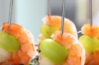 a fresh and delicious combo of a shrimp and grapes plus herbs will be an amazing appetizer for a tropical or beach wedding