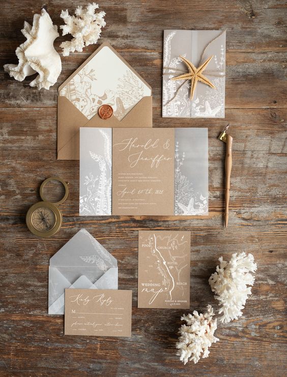 a lovely modern wedding invitation suite done in grey, tan and white, with seaside prints and elegant seals is a very cool idea