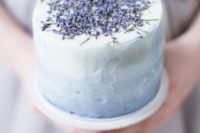 a textural ombre lavender wedding cake with soem lavender on top is a very chic idea