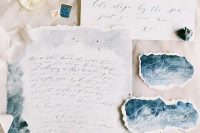 airy blue and grey watercolor wedding stationery with a raw edge for a beach or coastal wedding
