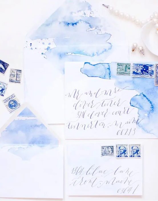 beautiful watercolor blue wedding stationary in shades of blue and purple is an amazing idea with a messy touch