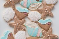 bright beach cookie favors shaped as various sea creatures and hearts are lovely and delicious