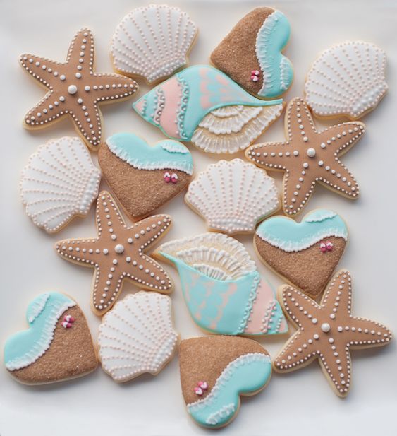 bright beach cookie favors shaped as various sea creatures and hearts are lovely and delicious