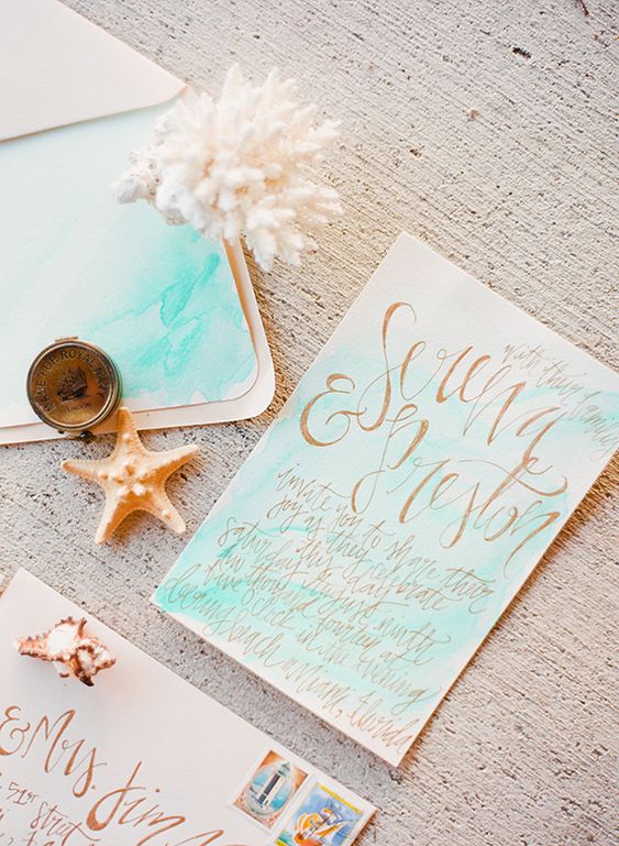 bright turquoise wedding invitations with watercolors, with gold calligraphy and pretty stamps are amazing