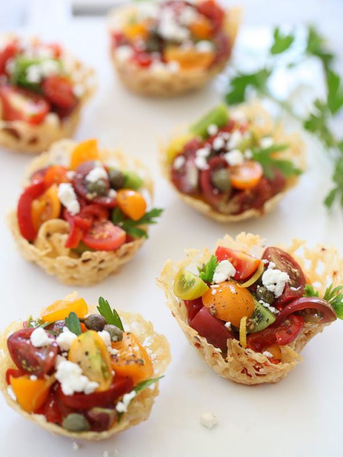 edible baskets filled with salad of tomatoes, cheese and greenery will please both carnivore and vegan guests