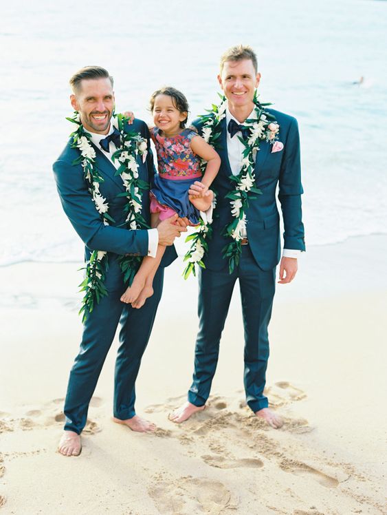 elegant blue tuxedos with bow ties and shirts plus bare feet are awesome for a more formal ceremony