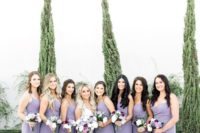 fitting lilac maxi bridesmaid dresses with spaghetti straps are a cool and very romantic idea