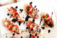 fresh strawberry goat cheese crostini with balsamic are a tasty and vegan-fitting appetizer