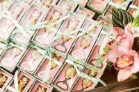 glam gold pineapple bottle openers packed in pink boxes are lovely and practical tropical beach wedding favors