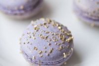 lilac macarons with edible gold touches on top are super glam, fun and chic