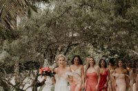 mismatching pink, red, blush and ombre maxi and midi bridesmaid dresses show off the style of each gal